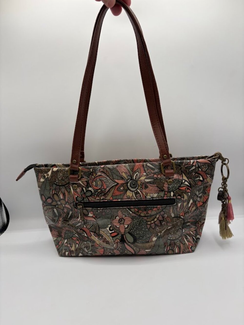 Sakroots Artist Circle shoulder bag in the "Sienna Spirit Desert" print,